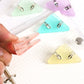 Transparent colored triangular clips for DIY